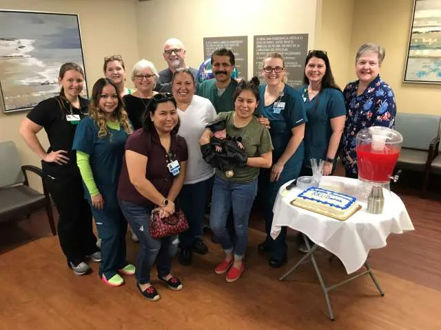 The neonatal team at DeTar Hospital North celebrates with the family of a recent NICU graduate